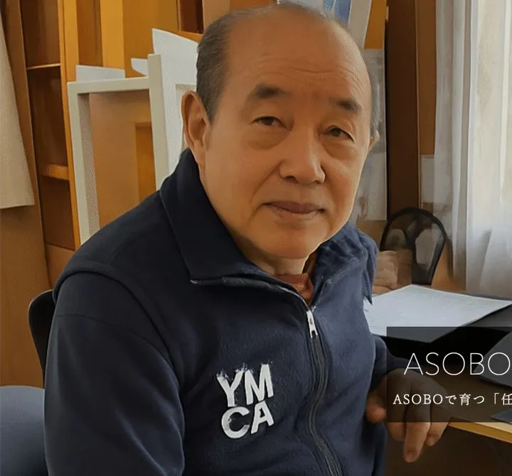 インタビューに答える八杉光春さん